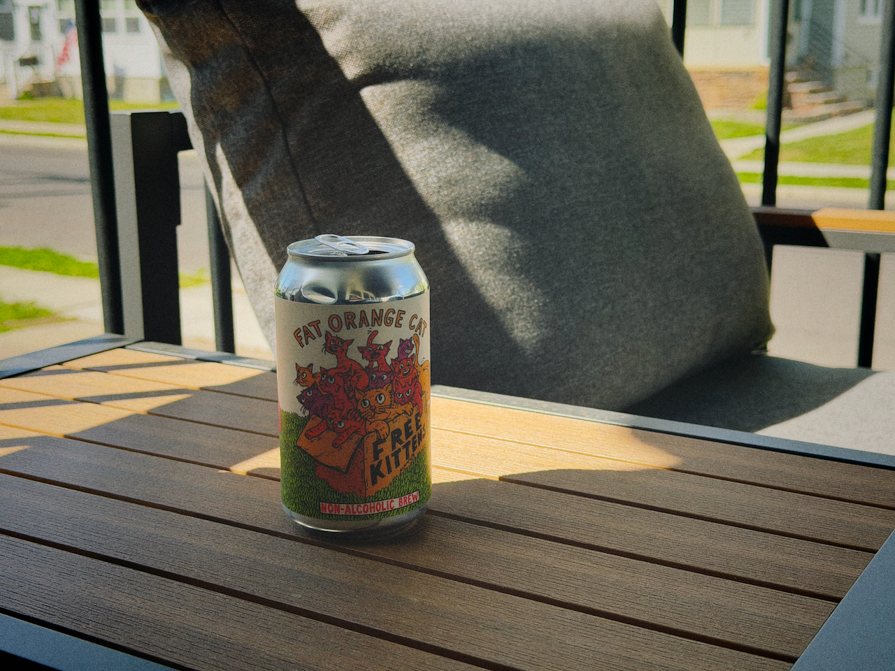 Free Kittens by Fat Orange Cat Brew Co., a Pilsner non-alcoholic beer
